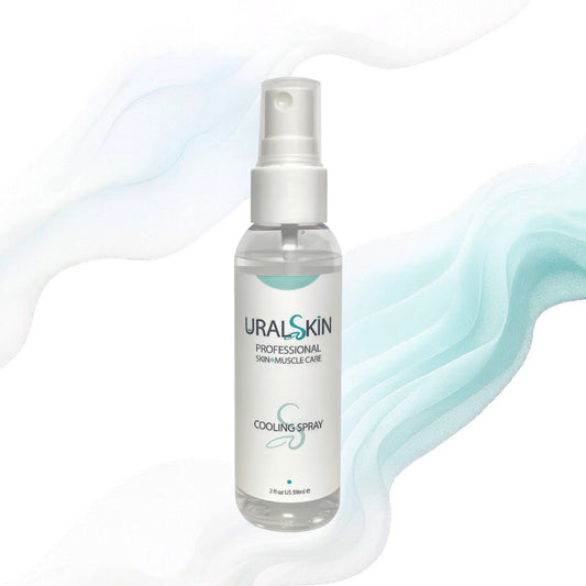URALSKIN Cooling Spray bottle on a white background with soft teal waves